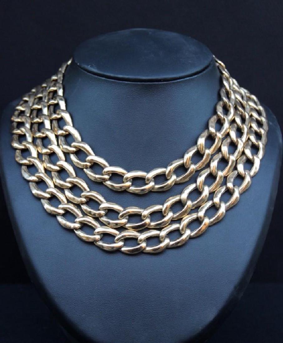 YVES SAINT LAURENT Collier à trois rangs de chaînes en (1 of 2)