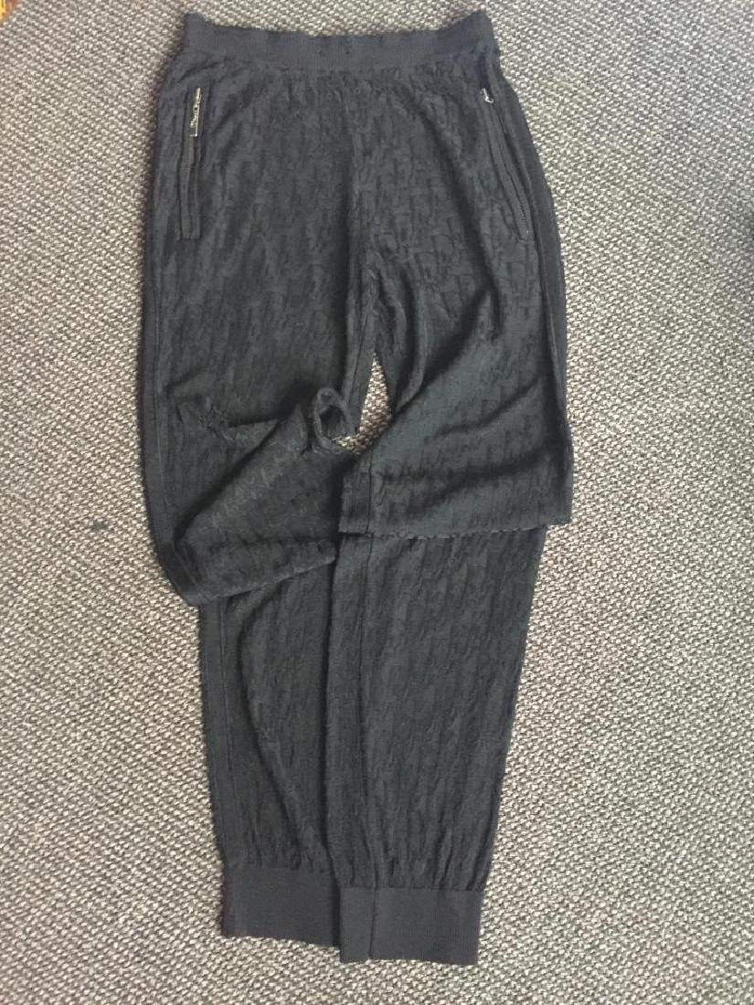 CHRISTIAN DIOR Legging en maille monogramme noir,: CHRISTIAN DIOR Legging en maille monogramme noir, taille élastique, poches zippées. Taille non indiquée (environ 38) État d'usage