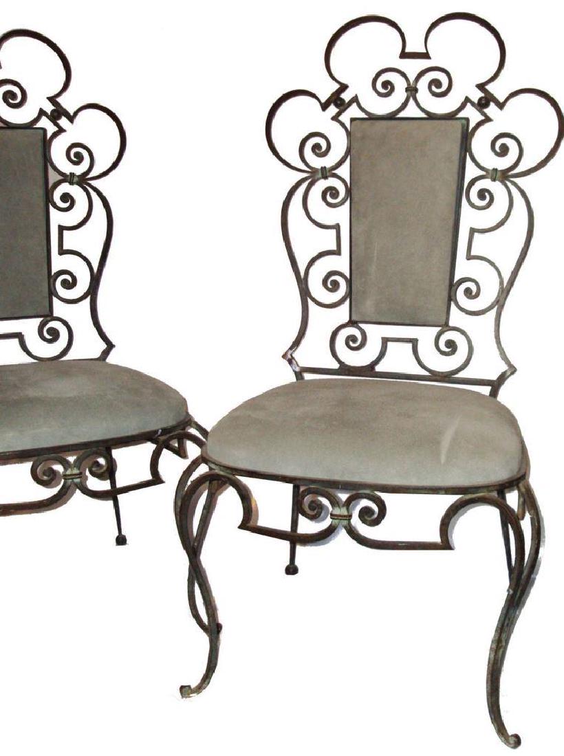 Raymond SUBES (1891-1970) - circa 1940_x000D_ Rare: Raymond SUBES (1891-1970) - circa 1940_x000D_ Rare paire de chaises en fer forgé à patine bronze vert et rouille, assises et dossiers recouverts de nubuck non d'origine_x000D_ 107 x 54 x 45