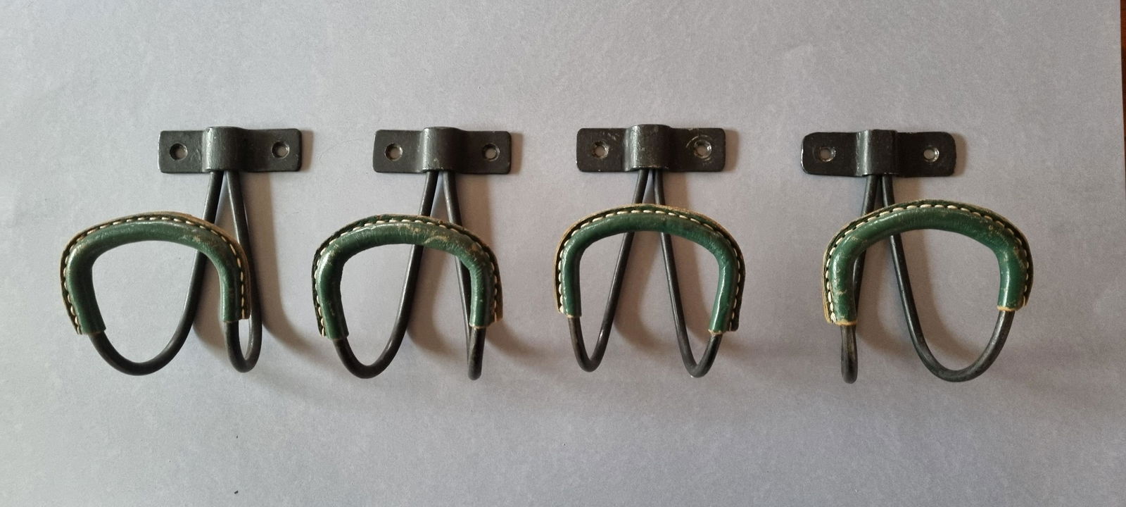 Jacques ADNET, vers 1950 Suite de quatre patères (1 of 2)