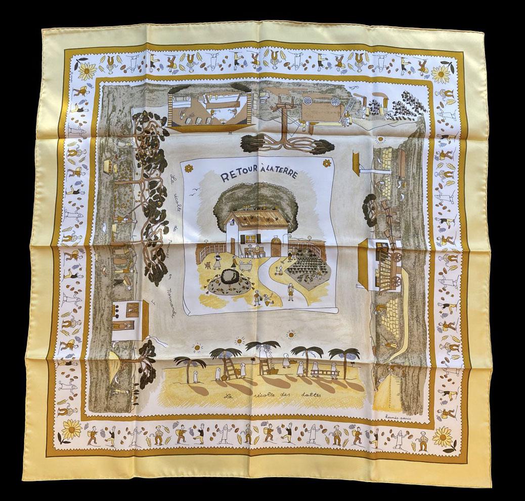 HERMES Carré en soie imprimée, titré: HERMES Carré en soie imprimée, titré "Retour à la terre" 90 x 90 cm (légèrement tâché)