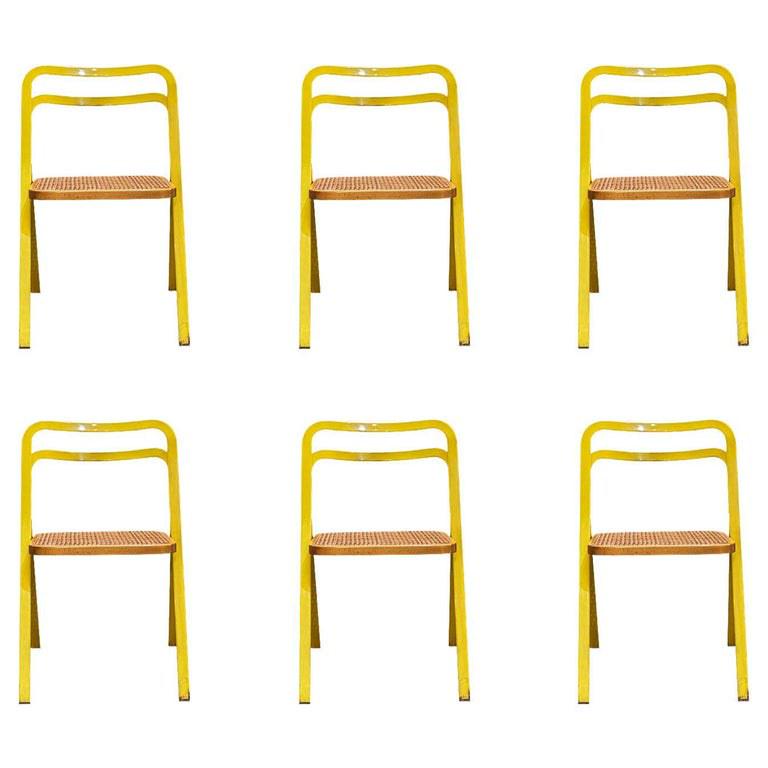 Giorgio CATTELAN pour CIDUE: Giorgio CATTELAN pour CIDUE Suite de six chaises, Métal et cannage, vers 1970. 78 x 49 x 50 cm * Vendu sur désignation