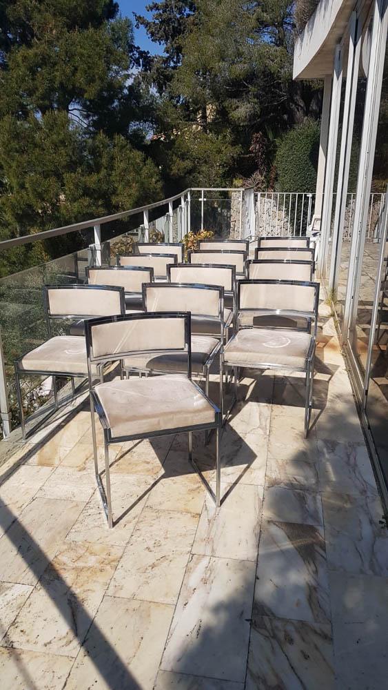 RIZZO - 14 CHAISES MODÈLE "SQ": Willy RIZZO (1928-2013)Rare série de quatorze chaises modèle SQ à structure en métal chromé et garniture de peau crème.77 x 48 x 45 cm Provenance : Domaine du Castellet,