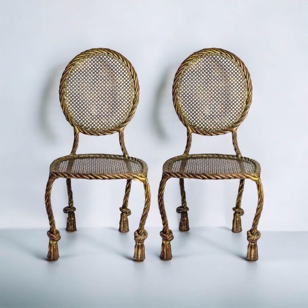 RAMSAY - 2 CHAISES EN FER DORÉ: RAMSAYPaire de chaises en fer doré à motif de corde47 x 40 x 87 cm* Vendu sur désignation