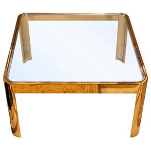 MAISON MALABERT - TABLE BASSE: Maison MALABERTTable basse en bronze doré et verre - Vers 197037 x 70 x 70 cm* Vendu sur désignation