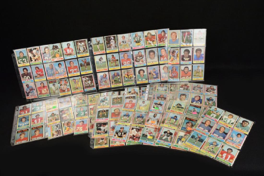(250+/-) 1974 Football Cards: (250+/-) 1974 Football cards. (2) Joe DeLamielleure rookie cards. Ed Marinaro, Jack Reynolds, Ken Anderson, Ted Hendricks, John Riggins, Paul Warfield, many more. Contact our recommended 3rd party "fo