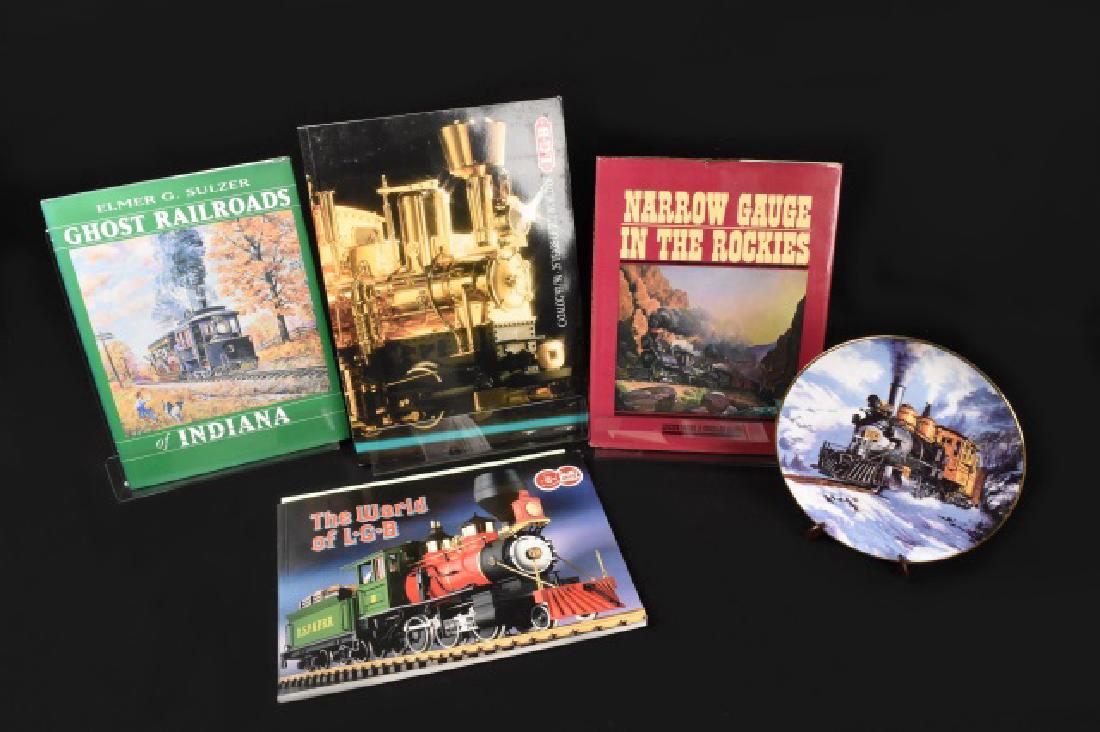 LGB Catalog Train Books & Royal Doulton Plate: Catalog 93'/94', 25 Years of The World of LBG. The World of LGB by Ernst Paul Lehmann, 1986. Narrow Gauge in The Rockies by Lucius Beebe & Charles Clegg. Ghost Railroads of Indiana by Elmer G. Sulzer.