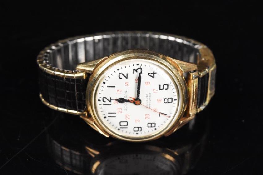 1970's Accutron Railroad Watch with Calender: Unique Mens 1970's Accutron Railroad Approved Watch by Bulova with scrolling calender in the Speidel pat. wrist band; calender dates 1973. Watch marked K06926 and is in decent condition. There is some