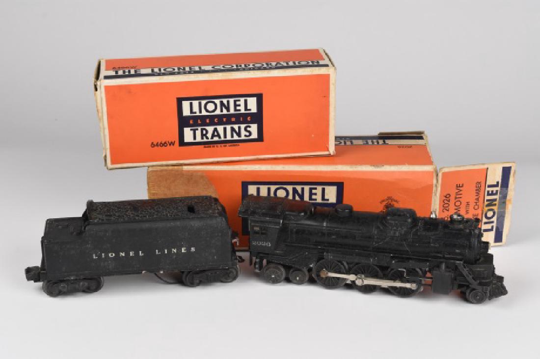 Lionel 2026 Locomotive & 6466 Whistle Tender: Lionel Locomotive with smoke chamber No. 2026. This electric locomotive is in decent used condition however it needs cleaned up a bit. It does come with original box but the box is not in the best con