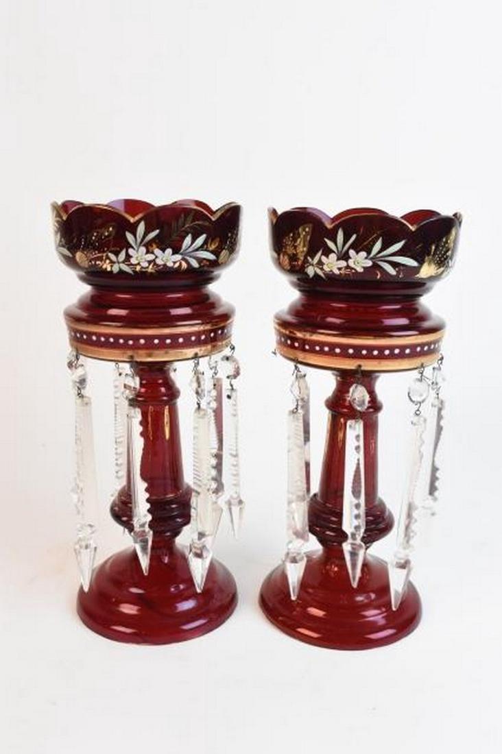 Pair Cranberry Glass & Enamel Mantle Lusters: Antique Pair of Cranberry Glass and Enamel Mantle Lusters measuring 12" tall. This pair is in fairly good condition however there is some wear the the gold embellishments and there are there are some