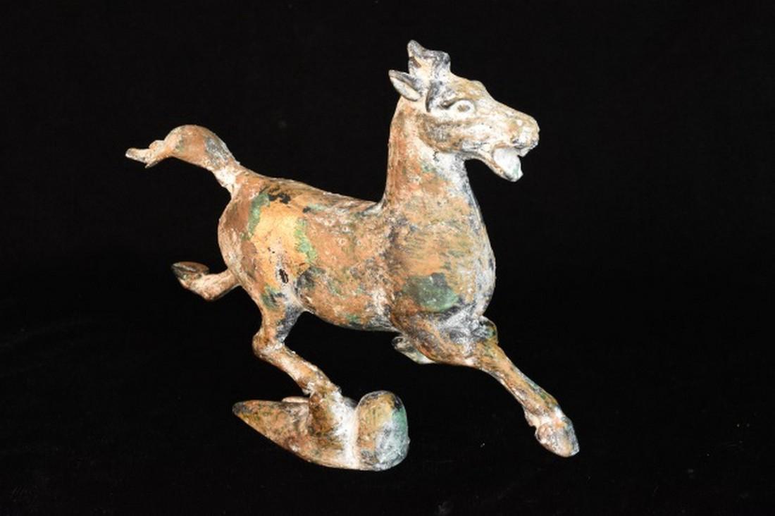 Painted Hollow Cast Horse Sculpture: Painted hollow cast iron galloping horse sculpture, 9" W x 7" H. Contact our recommended 3rd party "for profit" shipper Pak Mail at (260) 637-4809 or contact@pakmailshipsfortwayne.com for shipping quo