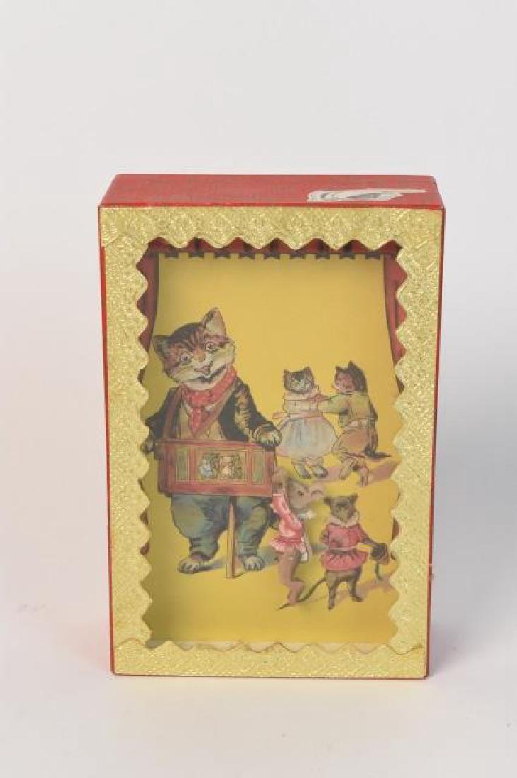 Unique Feline Shadow Box w/ Mouse Movement: Fun and unique feline shadow box, with glass front, weighted with sand, Pointing finger sticker on exterior of box. Contact our recommended 3rd party "for profit" shipper Pak Mail at (260) 637-4809 or
