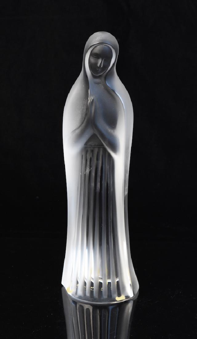Lalique France Virgin Mary Frosted Crystal Figurine: Lalique France Virgin Mary Madonna frosted crystal statue. Mary with head bowed in prayer, etched Lalique France on bottom, 10"H. Excellent condition. Contact our recommended 3rd party "for profit" sh