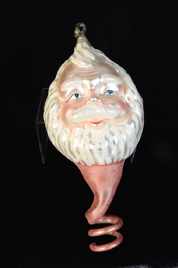 Large Dept. 56 Mercury Glass Santa Ornament: Vintage Department 56 Mercury Glass Santa Ornament with an old world appeal. This impressive ornament is 13" long and in very good condition. Contact our recommended 3rd party "for profit" shipper Pak