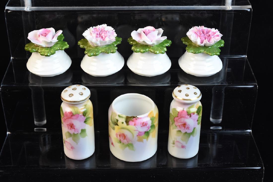 Aynsley & Nippon Salt and Pepper Shakers: (2) Pair of Aynsley salt and pepper shakers featuring a mini-carnation and tea rose on the top. Each are marked Aynsley English fine bone china. Also included a pair of Nippon salt and pepper shakers 
