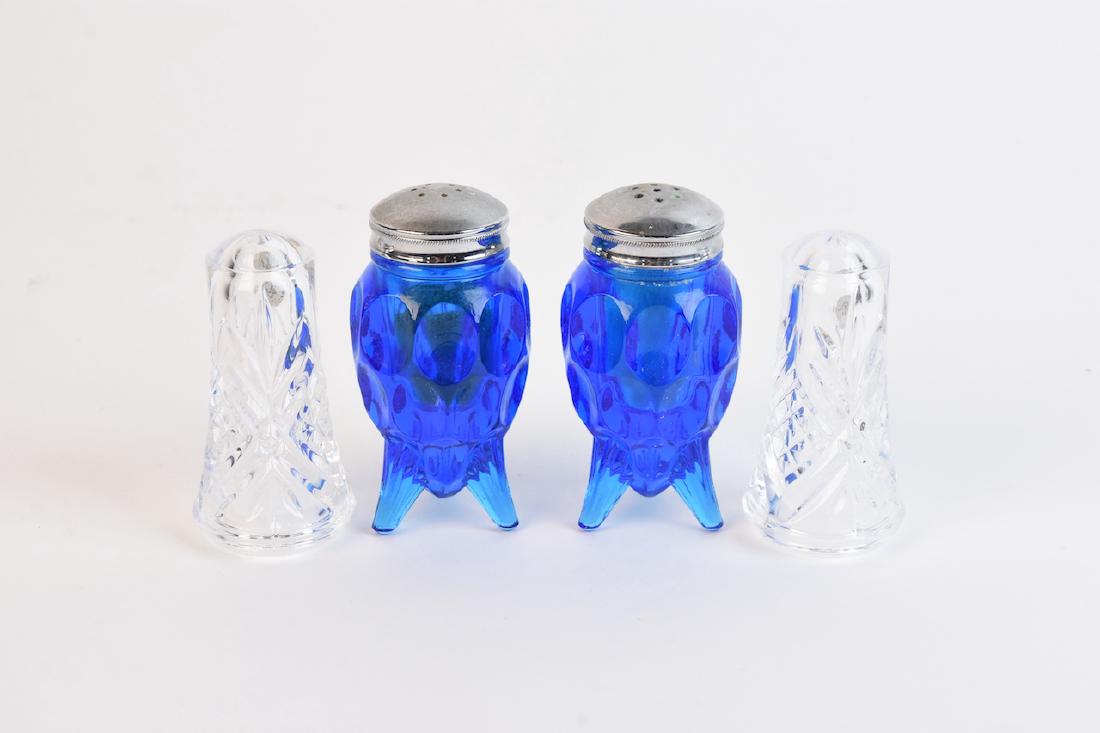 Vintage Blue Glass & Crystal Salt/Pepper Shakers: Vintage Retro three legged cobalt blue glass coin dot salt and pepper shaker with silver toned lids standing 3 1/2" tall. We also have French cut leaded crystal salt and pepper shakers from Cristal d'
