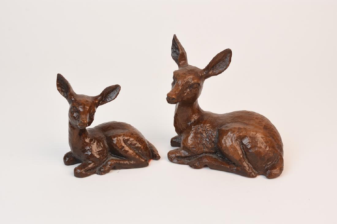Cas-Carved Wood Mule Deer Figurines: Finest quality cas-carved wood mule deer figurines with glossy finish. These little guys are in good condition with the tallest deer measuring roughly 4 1/2" x 4 1/2". Contact our recommended 3rd part