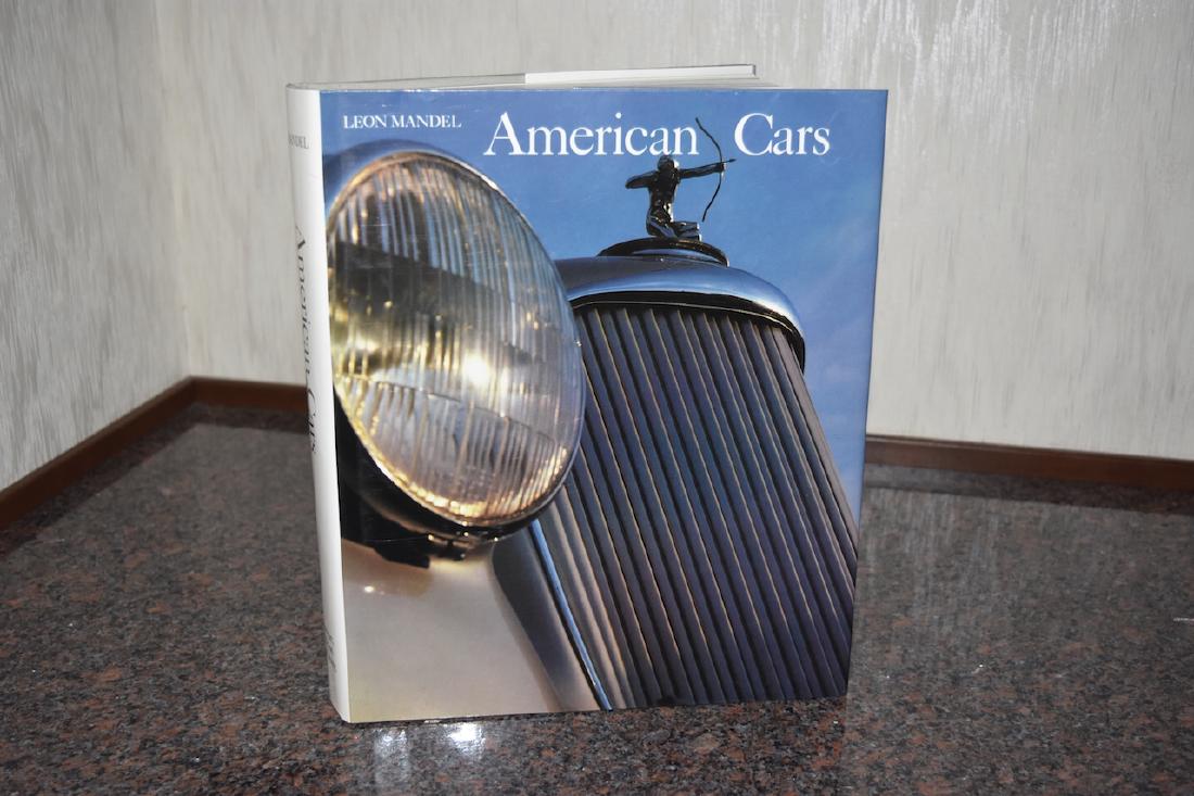 American Cars by Leon Mandel; book: Hardback book American Cars by Leon Nandel. This book features 450 full color illustrations from Harrah's Automobile Collection. It comes with the dust cover and is in very good condition. It measures