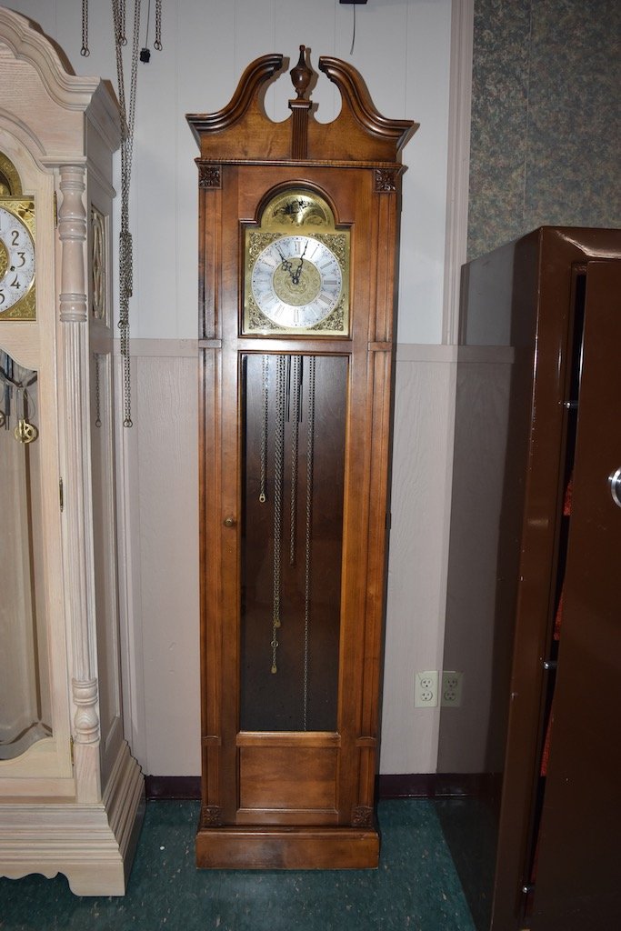 howard miller grandfather clock serial number search