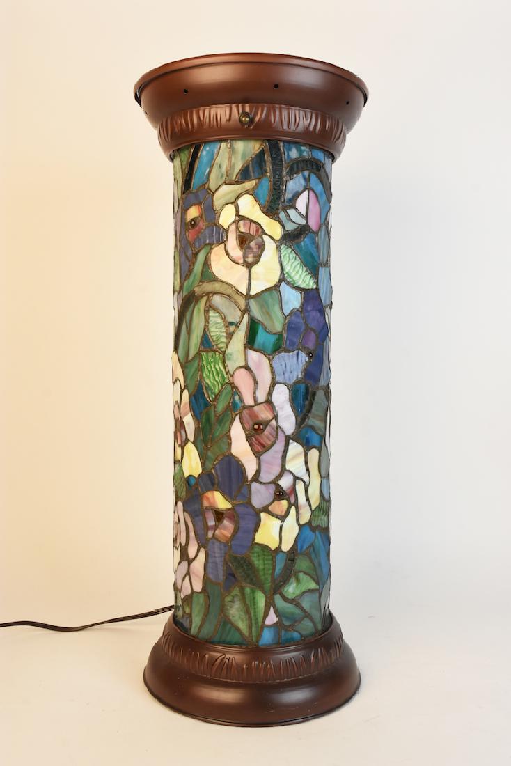 Lighted Stained Glass Pedestal; Bright Pastels: Lighted stained glass pedestal with bright colored pastel flowers and foliage. Perfect for a dark entryway this pedestal stands 26 1/4" and has a bronze colored base and top. It is quite beautiful and