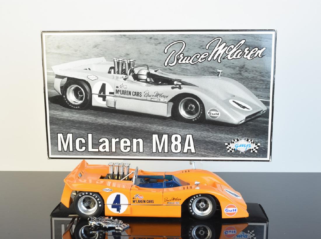 GMP 1968 Gulf McLaren M84 1:18 Die Cast: GMP 1968 1:18 scale #4 Gulf Bruce McLaren M84 by GMP. This model comes with the original box and is in good condition. It features functional steering plus opening doors and engine cover. It is one of