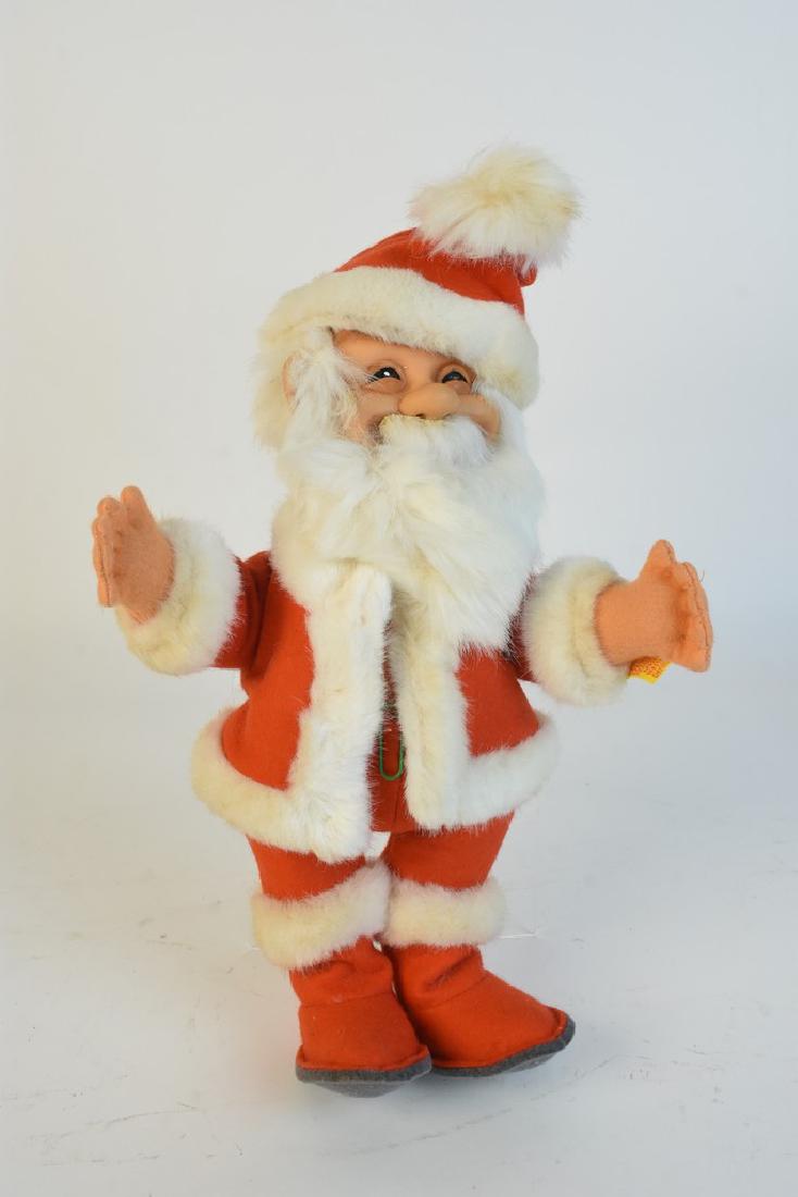 Santa Claus 1953 Replica Steiff: Santa Claus Steiff 1953 replica, 11" H. In very good condition. Contact our recommended 3rd party "for profit" shipper Pak Mail at (260) 637-4809 or contact@pakmailshipsfortwayne.com for shipping quot