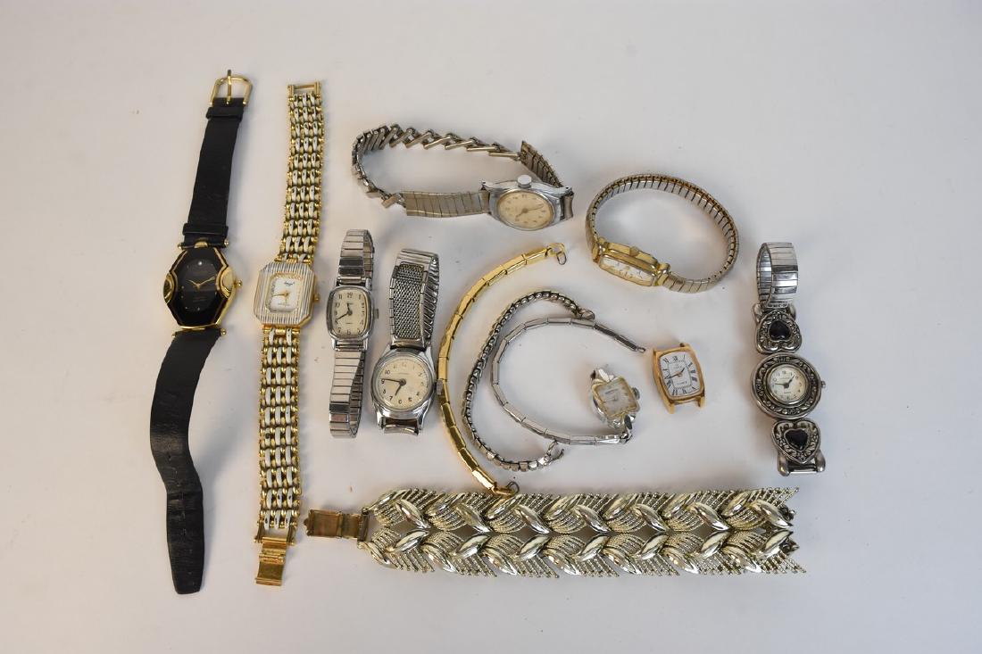 Assorted Women's Watches and Coro Bracelet: Collection of women's watches including (2) silver toned quartz Timex, a faded gold toned quartz Xanadu, a silver toned Styline, a silver toned Frontenac, a silver toned Persona, a gold toned Timex, a