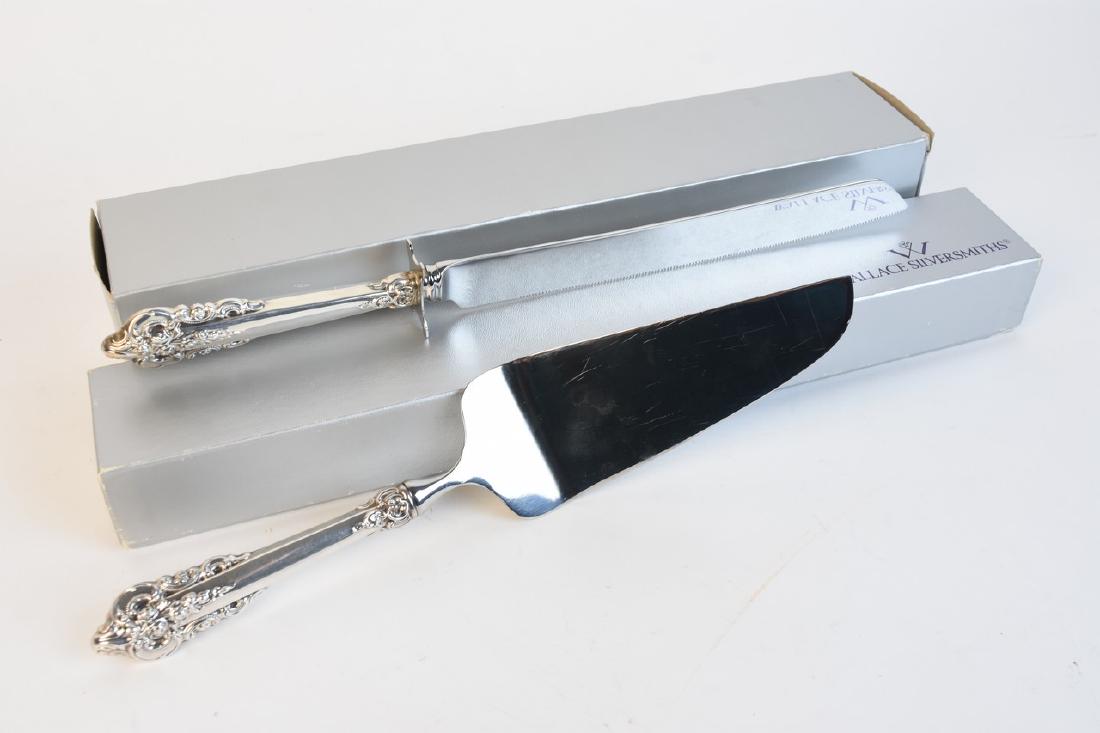 Wallace Silversmiths Sterling Handle Knife & Pie Server: Wallace Silversmiths carving knife and pie server in the Grande Baroque pattern, both with sterling handles. Knife measures 12 1/2" L. Comes in original boxes. Contact our recommended 3rd party "for p