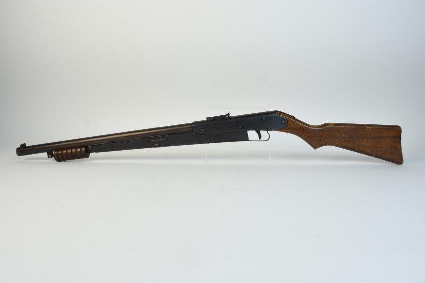 Vintage 1960's Daisy No. 25 Pump BB Gun: Childs Vintage 1960's Daisy No. 25 pump action BB gun in good working condition. Made in Plymouth, MI this BB gun has a good overall patina with minor imperfection on the wood stock. It measures 36 1/