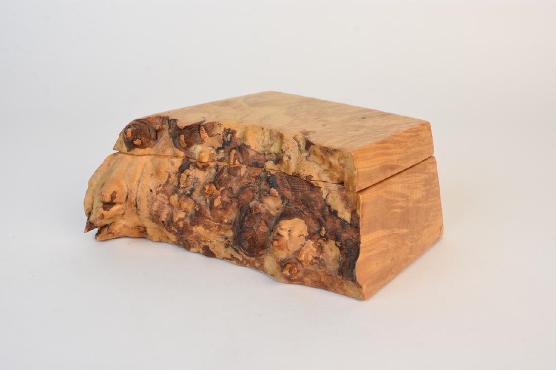 Michael Elkan Burl Wood Box; signed: Studio hand turned burl wood lidded box by American artist and master craftsman Michael Elkan (1942-2014). Originally born in Pennsylvania Elkan moved to Oregon in 1973 and is know not only for his ma