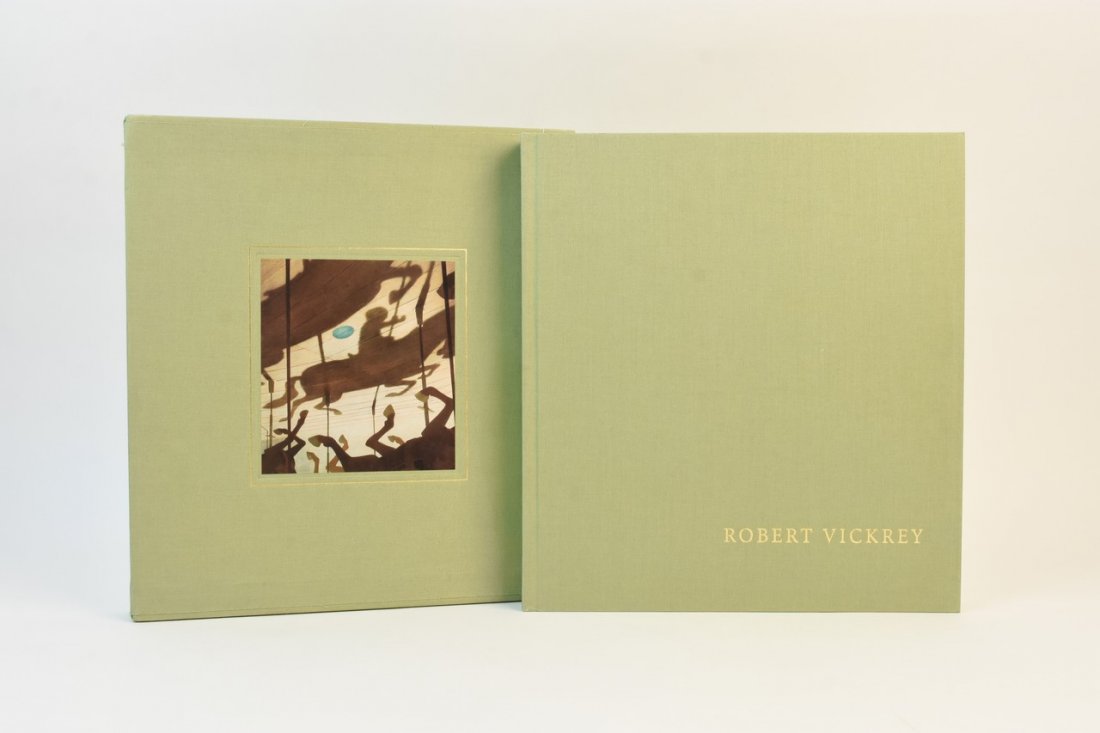 Robert Vickrey "The Magic of Realism" Signed Book: "The Magic of Realism" by Philip Eliasoph featuring the works and life of Robert Vickrey (1926-2011). This is a first edition book with hardback cover, protective case and it is signed by the artist, 