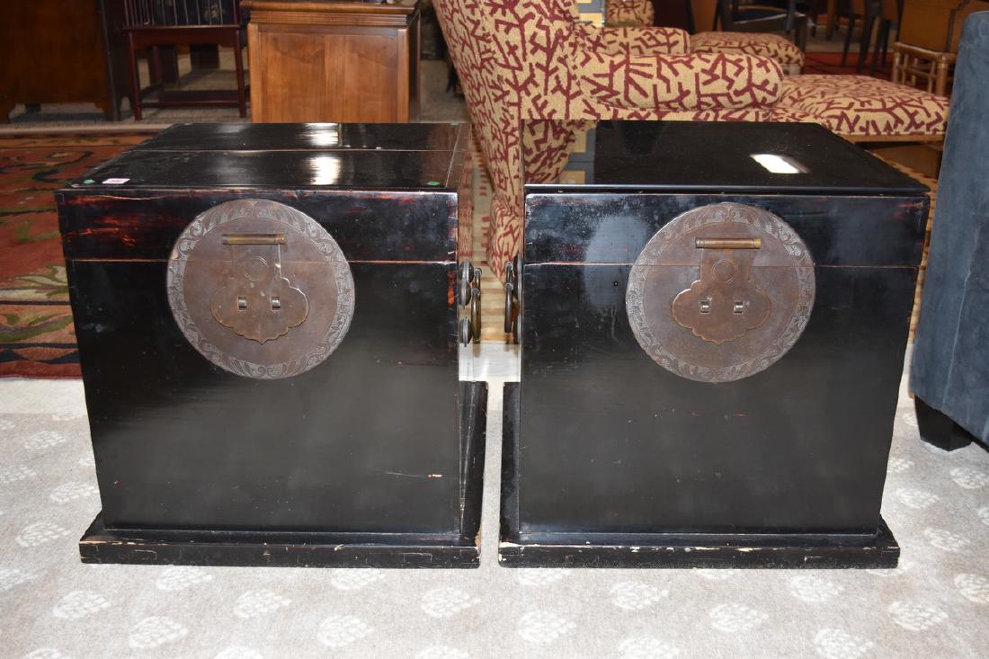 Pair of Square Asian Style Wood Chest: Pair of wood Asian style storage chest with tinted glass toppers, metal hardware, lock and a hinged lid. These square chest measure 21"w x 21"d x 20"t and are in good used condition with wear from use