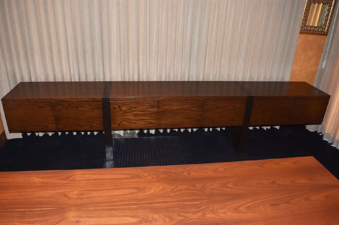 Dunbar Mid-Century Storage Console: Dunbar mid-century modern storage console. This handsome piece has three file sized drawers in the middle and two doors on each side that expose an open space behind three of the doors and a three par