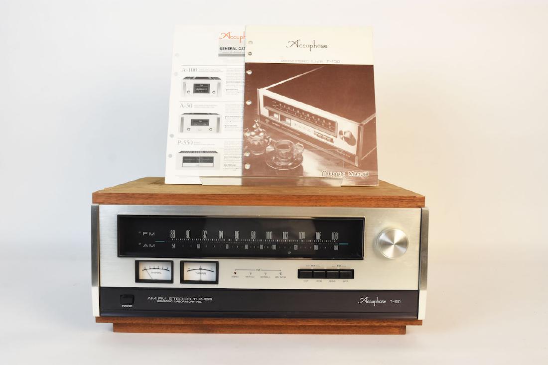 TEAC Accuphase T-100 AM/FM Stereo Tuner: Vintage TEAC Accuphase T-100 AM/FM stereo tuner from Kensonic Laboratory Inc. with original cabinet and manual. It is in good working condition with minimal wear from age and use. Contact our recommen