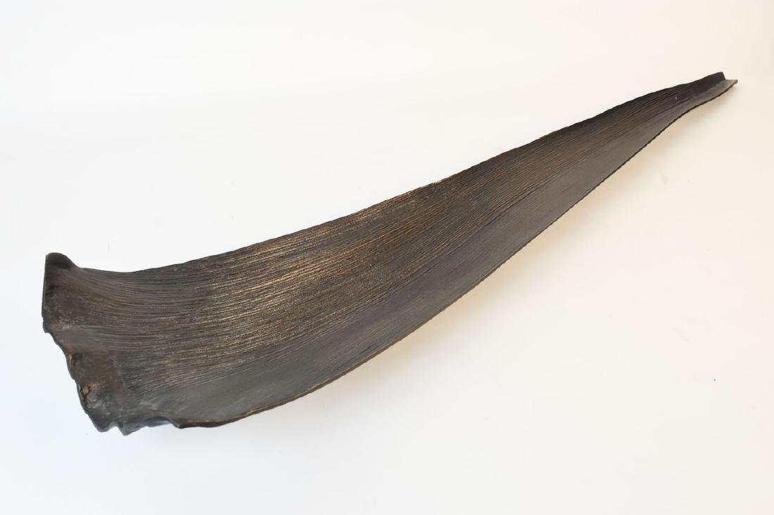 Michael Aram Naturalist Centerpiece: Bronze colored Michael Aram's leaf shape centerpiece bowl. This stunning naturalist piece measures 44" long and is marked Michael Aram on the bottom. Contact our recommended 3rd party "for profit" shi