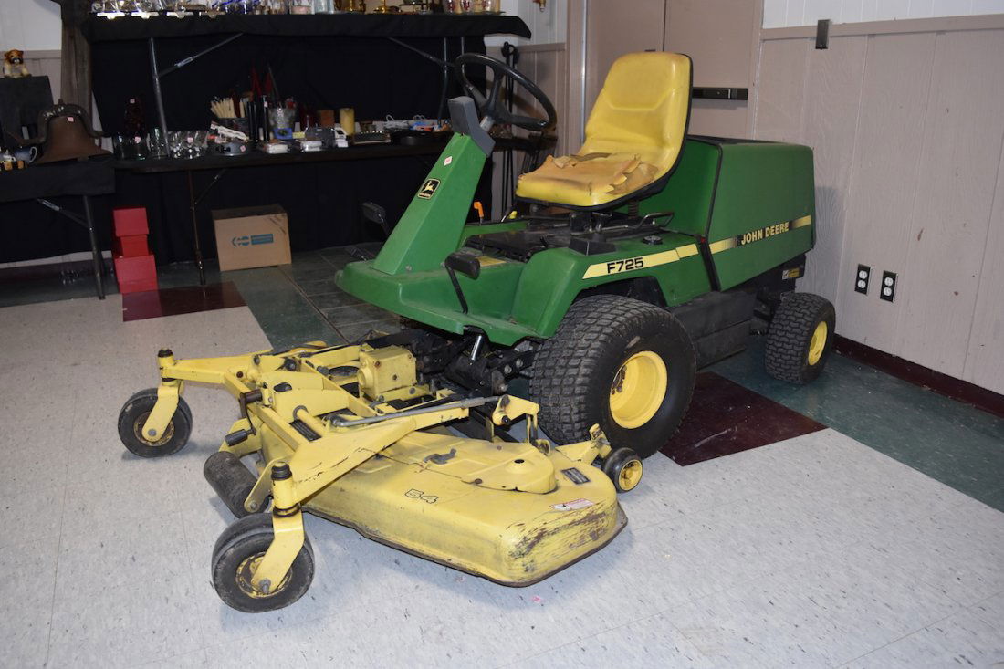 John Deere F725 Riding Mower w/ 54" Deck: John Deere riding mower, 54". Serial Number M054FMX011334. Seat has a tare, blade does not operate, needs minor repair.