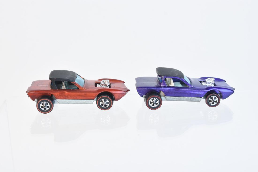 1968 Redline Hot Wheels Python Cars (HK): A pair of Hot Wheels redline series 1968 Python cars; Hong Kong variants. The cars are presented in orange and purple. Paint feels thicker in areas; surface scuffs and scratches; discoloration and sta