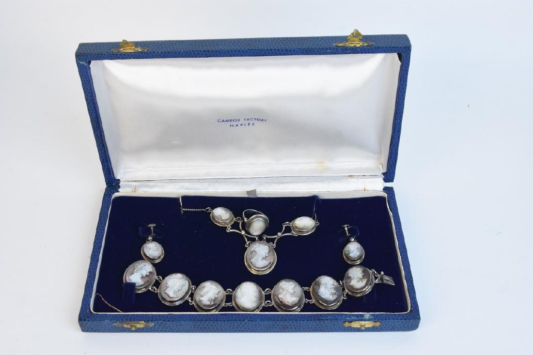 800 Silver and Abalone Vintage Demi-Parure Cameo t: A set of vintage jewelry featuring abalone cameo detail on 800 silver. The pieces are presented in the original Cameo Factory of Naples, Italy box. Ring: 0.10ozt, marked "800"; Screw-Back Earrings: 0.