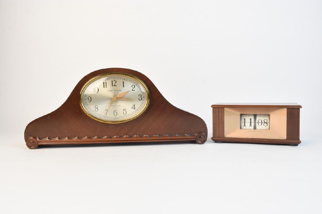 General Electric Westminister Chime & Flip Clock: General Electric Westminister chime clock model 416. Clock works and the chime sounds amazing, measures 16 1/2" x 7" x 4". There is a section of veneer missing on backside, cracking of veneer. We also