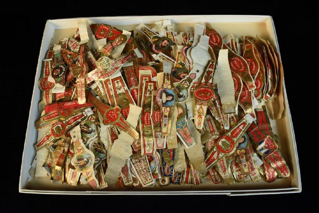 100+ Nice Assortment of Antique Cigar Bands: 100+ Nice assortment of antique cigar bands. (Anna Held, Palma de Cuba, Bayuk Bros., Bohemian Club and much more). Tobacciana ephemera. Contact our recommended 3rd party "for profit" shipper Pak Mail