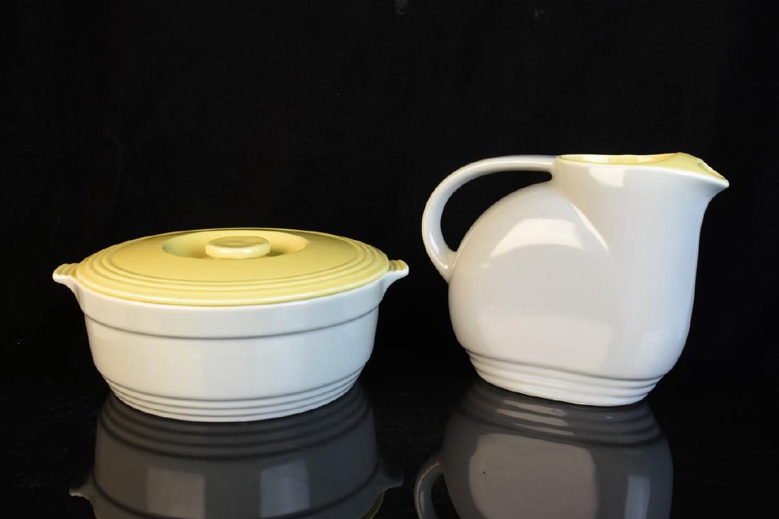 GE Refrigerators Hall Ovenware China Set: Refrigerators Hall Ovenware China made for General Electric. The dish is glazed grey with bright yellow interior and comes with a bright yellow lid and coordinating pitcher. Covered dish measures 8" d