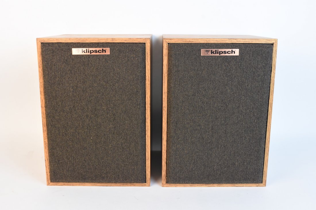 Klipsch KG-1 Oak Bookshelf Speakers: A pair of oak cased KG-1 bookshelf speakers. P/N: 09001131120; S/N 96852 & 96851. Impedance 8Ohms. Untested, very light cosmetic wear primarily to top. One measures approximately 13" H x 9.5" W x 9.5"