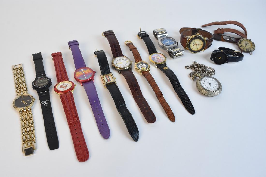 Assortment of Watches: An assortment of watches including a K.W. Co. of New York silver tone pocket watch; a vintage Seiko men's date keeping watch; a Lorus Mickey Mouse watch; a Warner Brothers Looney Tunes watch; a Disney