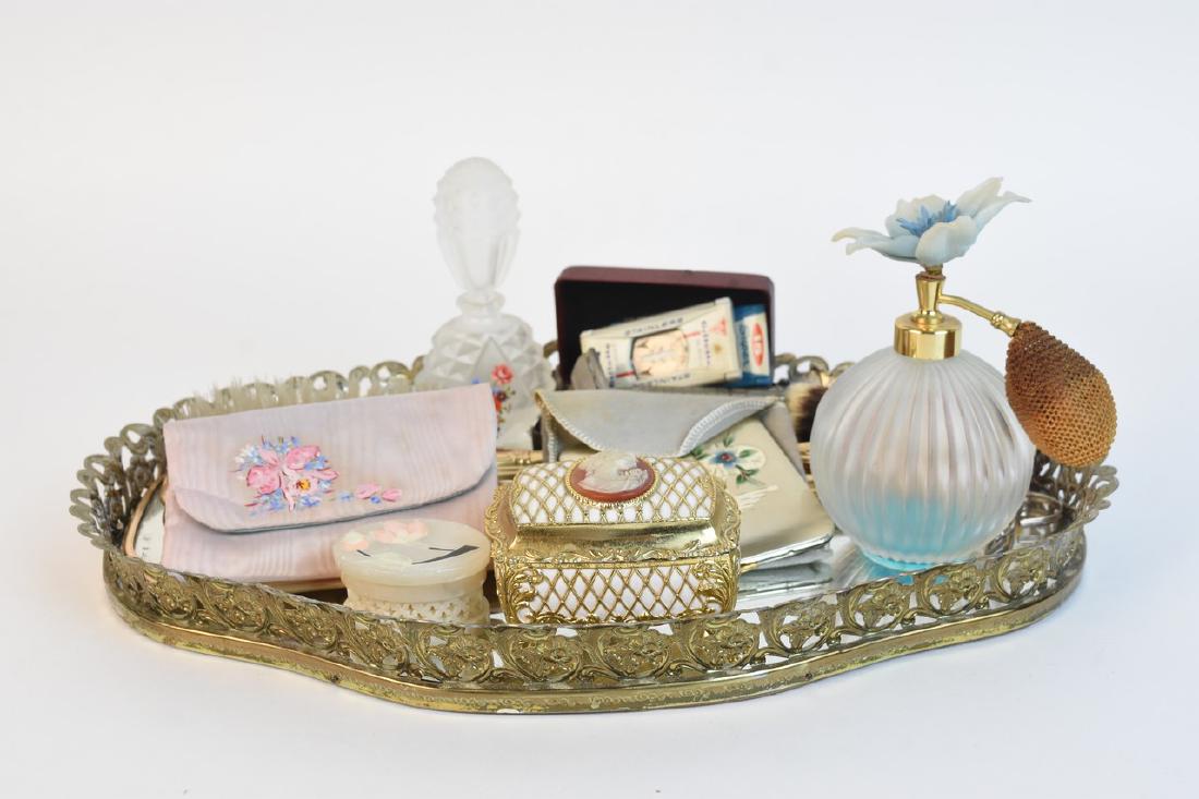 Vintage Men & Women: A vanity lot featuring items for men and women. This vintage lot includes two glass perfume bottles; a Mohawk shaving brush; a fabric case featuring sewing needles & thread; a cameo musical trinket bo