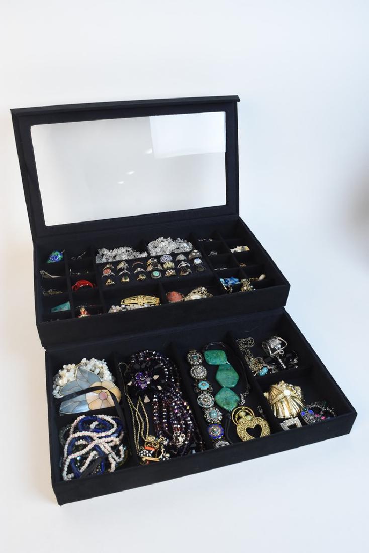 Assorted Jewlery Incl. Diamonds & Sterling: An assortment of costume jewelry with two sterling silver rings featuring diamond accents (less than 1 carat/ea). The ring with the citrine gemstone weighs approximately 0.10 ozt; the minimalist ring 