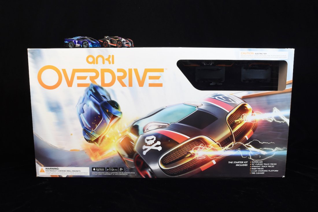 Anki Overdrive Starter Kit Mobile Device Race Set: Contains 10 Anki Overdrive flextrack pieces to build eight unique track combinations. Comes with a red and blue race car. Each player must have a compatible IOS or Android device to play. Comes in ori
