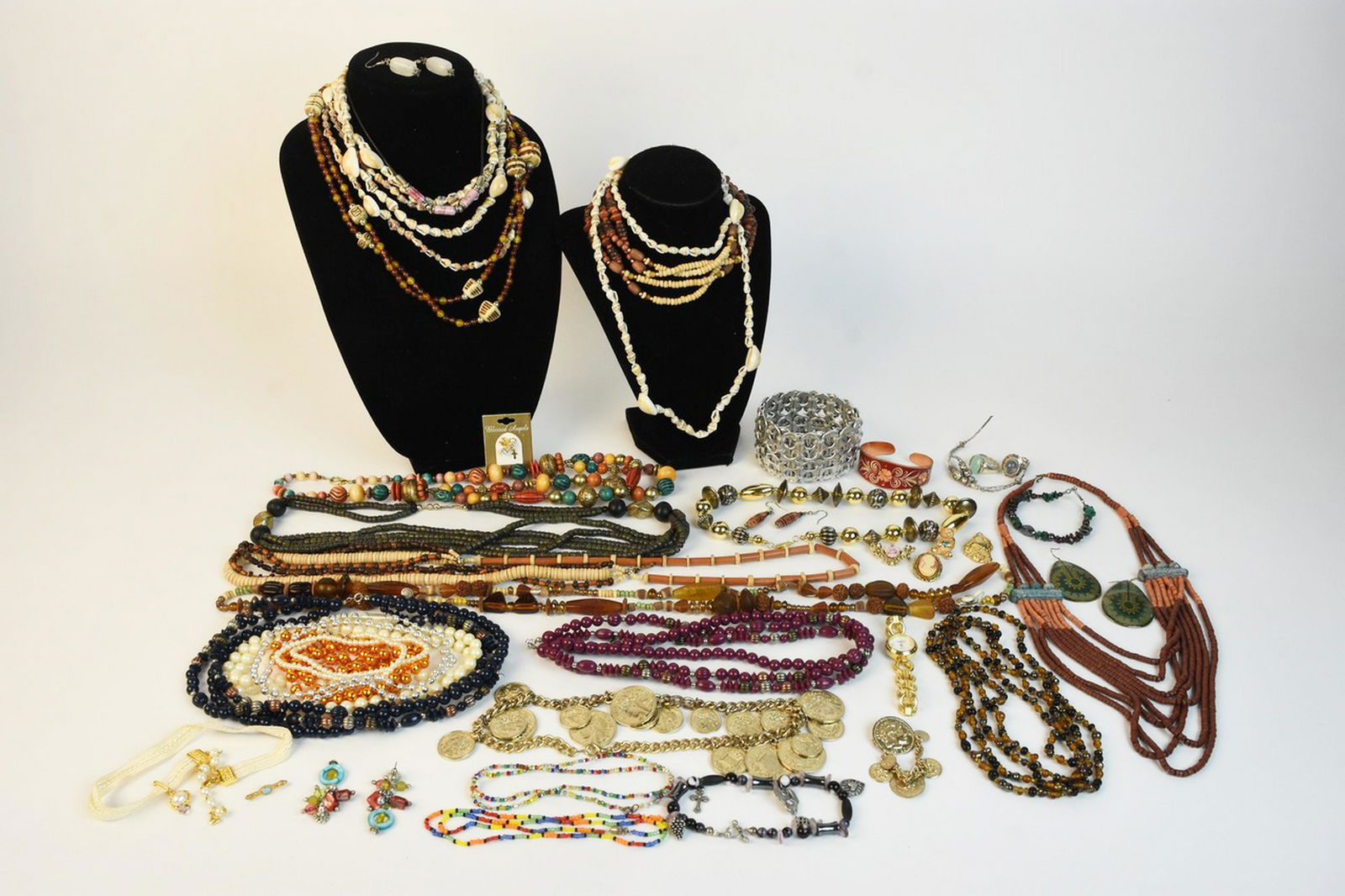 Costume Jewelry Incl. Sterling: An assortment of necklaces, bracelets, rings, and more. Brands include Anne Klein and Avon. Approx. 0.20 ozt of weighable silver. Condition varies. Contact our recommended 3rd party "for profit" shipp