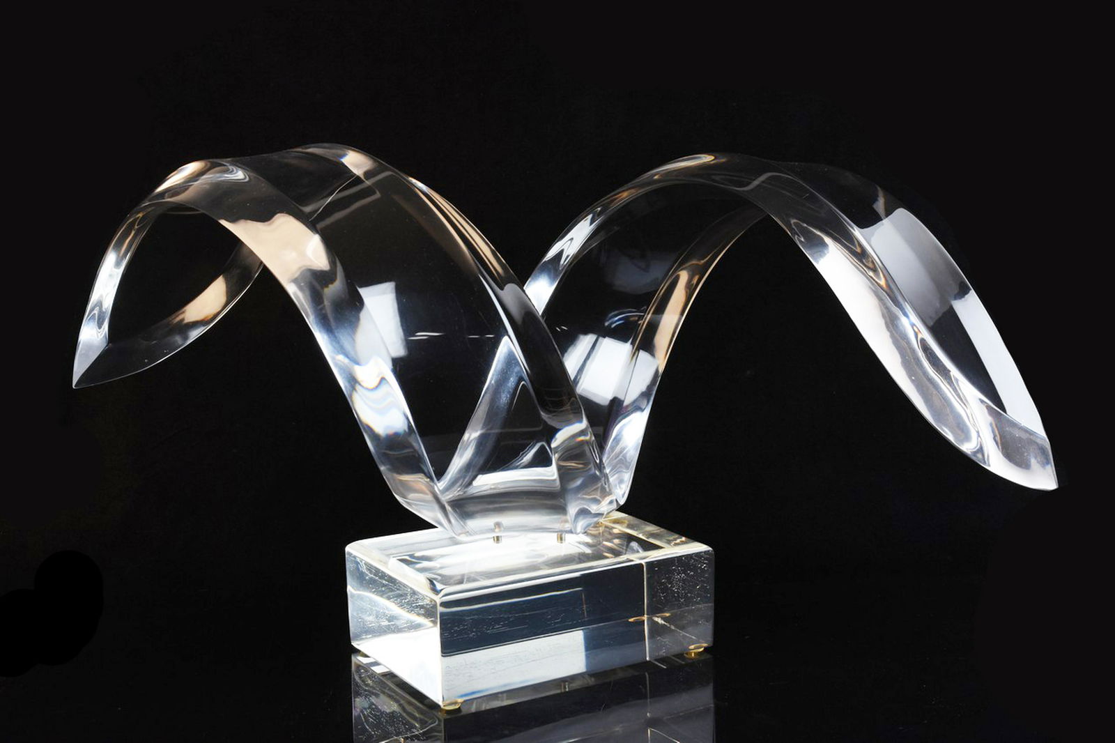 Hivo Van Teal Signed Acrylic Modernist Sculpture: A modernist acrylic sculpture signed "Hivo Van Teal" to its base. The sculpture is in the shape of a coil. Measures approx. 10" H x 13" D x 16" W. Light surface imperfections and bubbling. Contact our