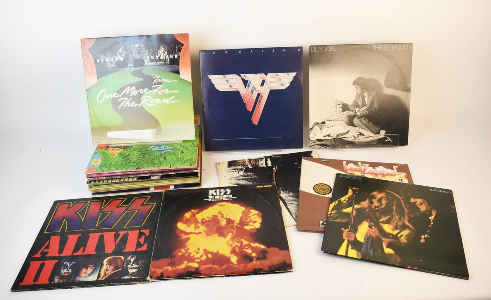 (22) Records Incl. Kiss, The Rolling Stones, Van +: A selection of twenty-two vinyl records including Kiss, Foreigner, Three Dog Night, Stevie Wonder, The Who, Van Halen, Boston, Led Zeppelin, The Rolling Stones, The Beach Boys, and more. Condition var