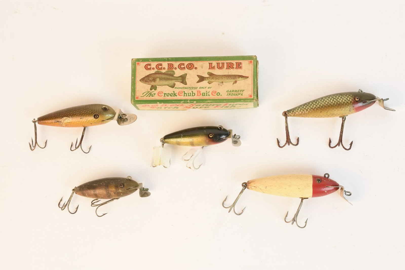 Creek Chub Wigglers Fishing Lures: Creek Chub Wigglers fishing lures and Creek Chub Wiggler Chub Finish box No. 100. Contact our recommended 3rd party "for profit" shipper Pak Mail at (260) 637-4809 or contact@pakmailshipsfortwayne.com